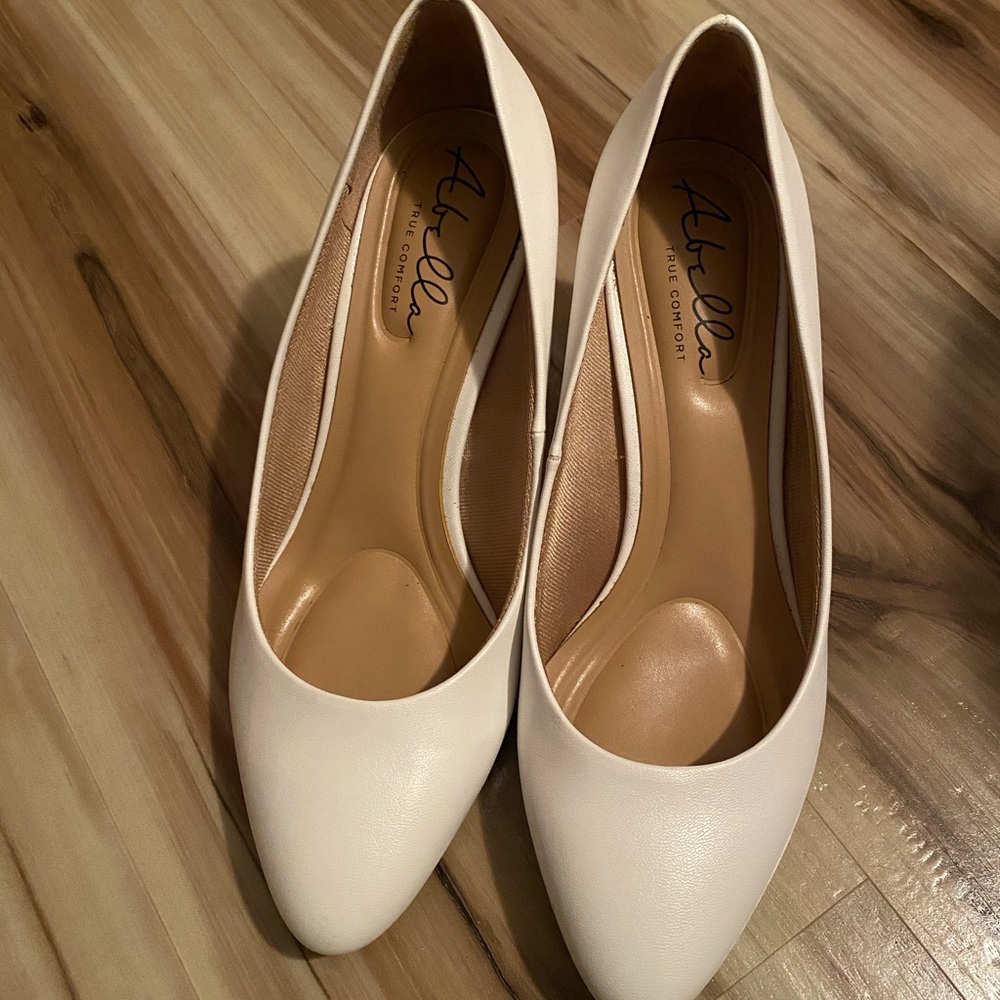 Abella White Pumps